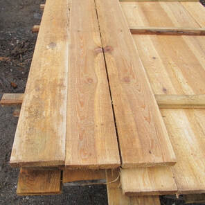 Stacked Rough Cut Lumber